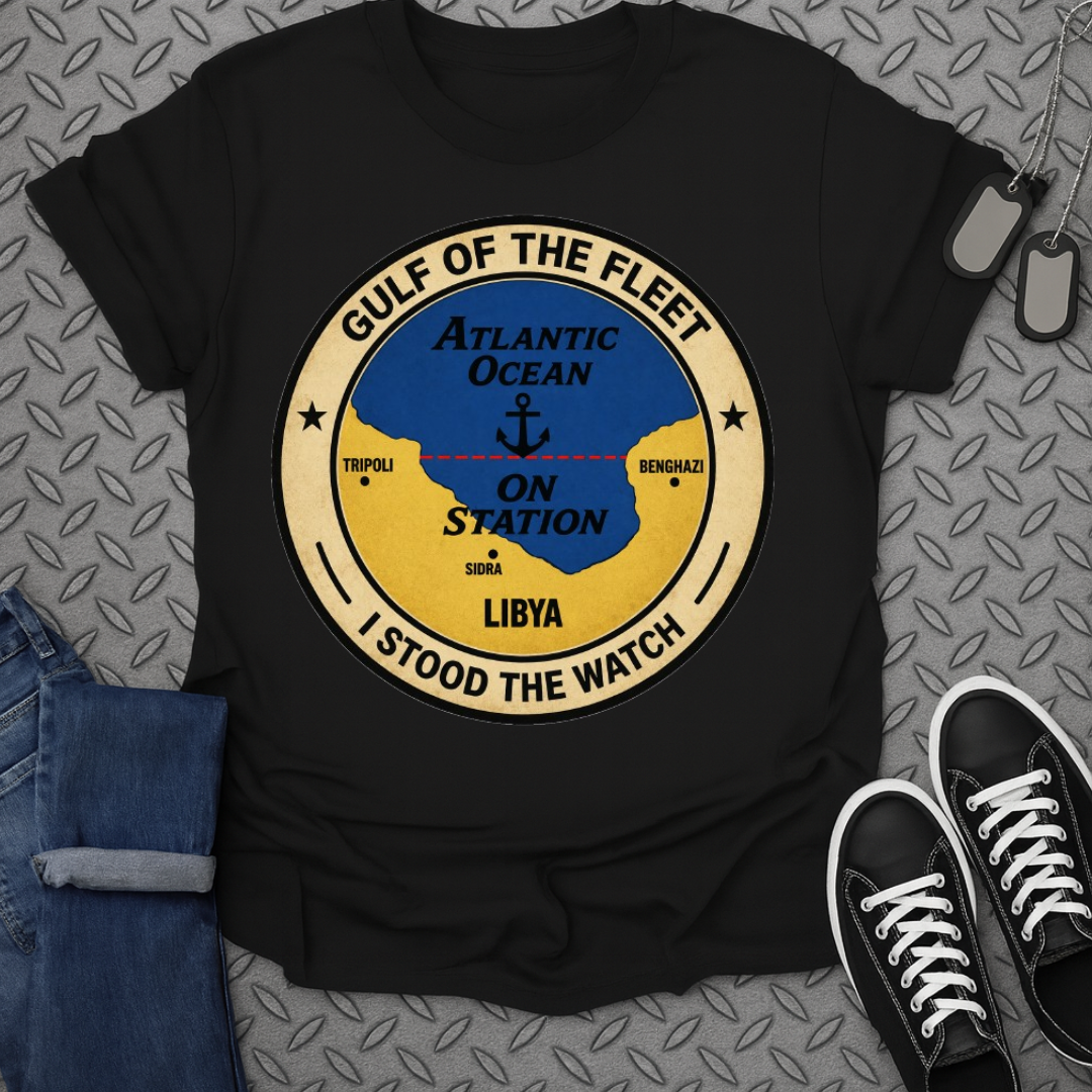 Black t-shirt with circular emblem showing map locations Tripoli, Sidra, Benghazi, and text "Gulf of the Fleet, Atlantic Ocean, On Station, I Stood the Watch".